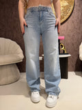 Jeans con brillantini e pizzo