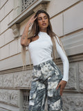 Top monospalla bianco