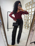 Blusa in pizzo con scollo e lacci sulla manica