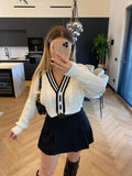 Maglione/ cardigan bianco nero con bottoni