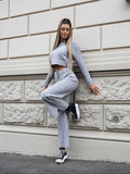 Completo maglia e pantalone grigio a righe