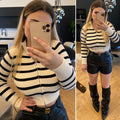 Maglione a righe con zip