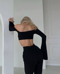 Due pezzi top e pantalone nero