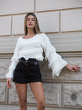 Maglione bianco con frange