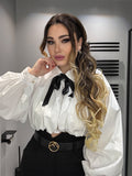 Camicia bianca con fiocco