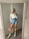 Maglione bianco con scollo e manica in camicia