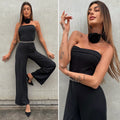 Tuta a fascia con collana rosa