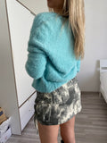 Due pezzi Cardigan e top