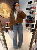 Jeans con risvolto e strass