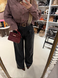 Pantalone in ecopelle con cintura