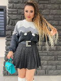 Maglione grigio con maxi paillettes