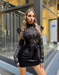 Abito in pizzo nero con fiocco