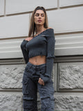 Maglione grigio con scollo a barchetta