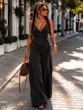 Tuta denim nero elasticizzata con tasche