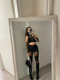 Pantalone nero con trasparenze