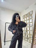 Completo con felpa over e brillantini pantalone a zampa