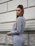 Completo maglia e pantalone grigio a righe