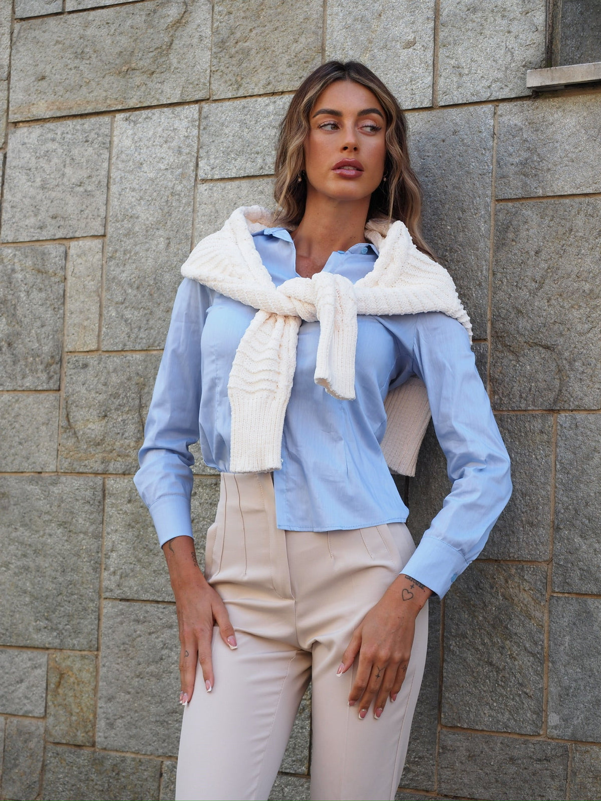 Maglione panna con trecce