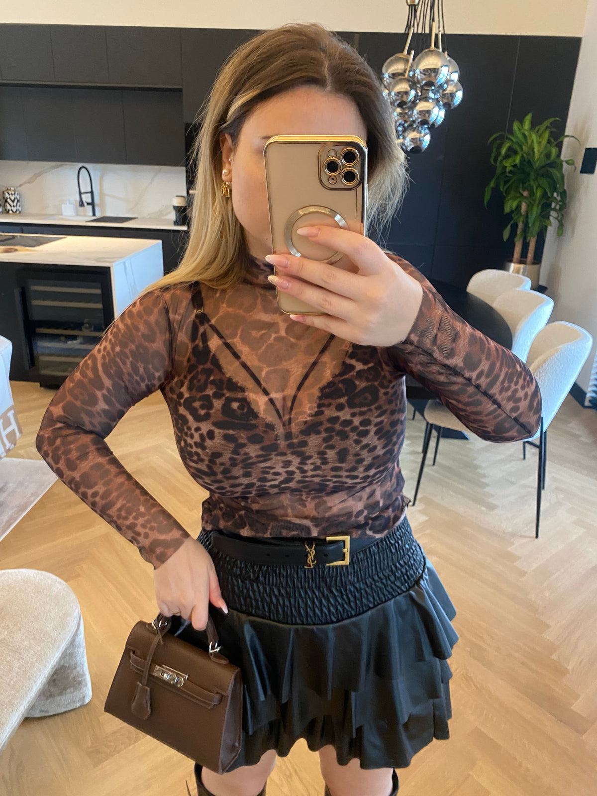 Blusa in velo animalier
