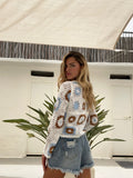 Short denim chiaro con strappini