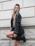 Giacca di ecopelle con fibbie