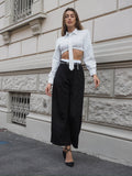 Pantalone nero con dettaglio bianco