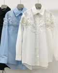 Camicia con fiori ricamati