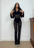 Due pezzi body e pantaloni in pizzo