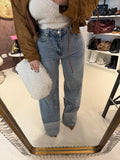 Jeans con risvolto e strass
