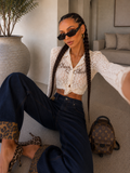 Jeans wide leg con dettagli maculati