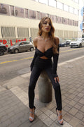 Tuta aderente con nodo nero