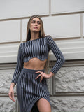 Completo due pezzi maglione e gonna grigio