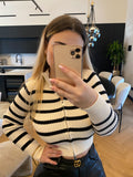 Maglione a righe con zip