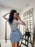 Maglia in pizzo collo alto