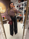 Pantalone in ecopelle con cintura