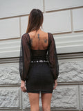Abito nero glitter maniche morbide