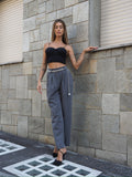 Completo smanicato e pantalone grigio