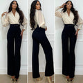 Tuta beige nero con cintura