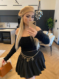 Maglioncino a trecce nero