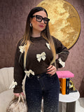 Maglione con fiocchi