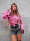 Maglione rosa barbie con frange