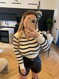 Maglione a righe con zip