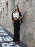 Pantalone nero a zampa