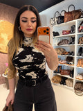 Completo top e pantalone cow print
