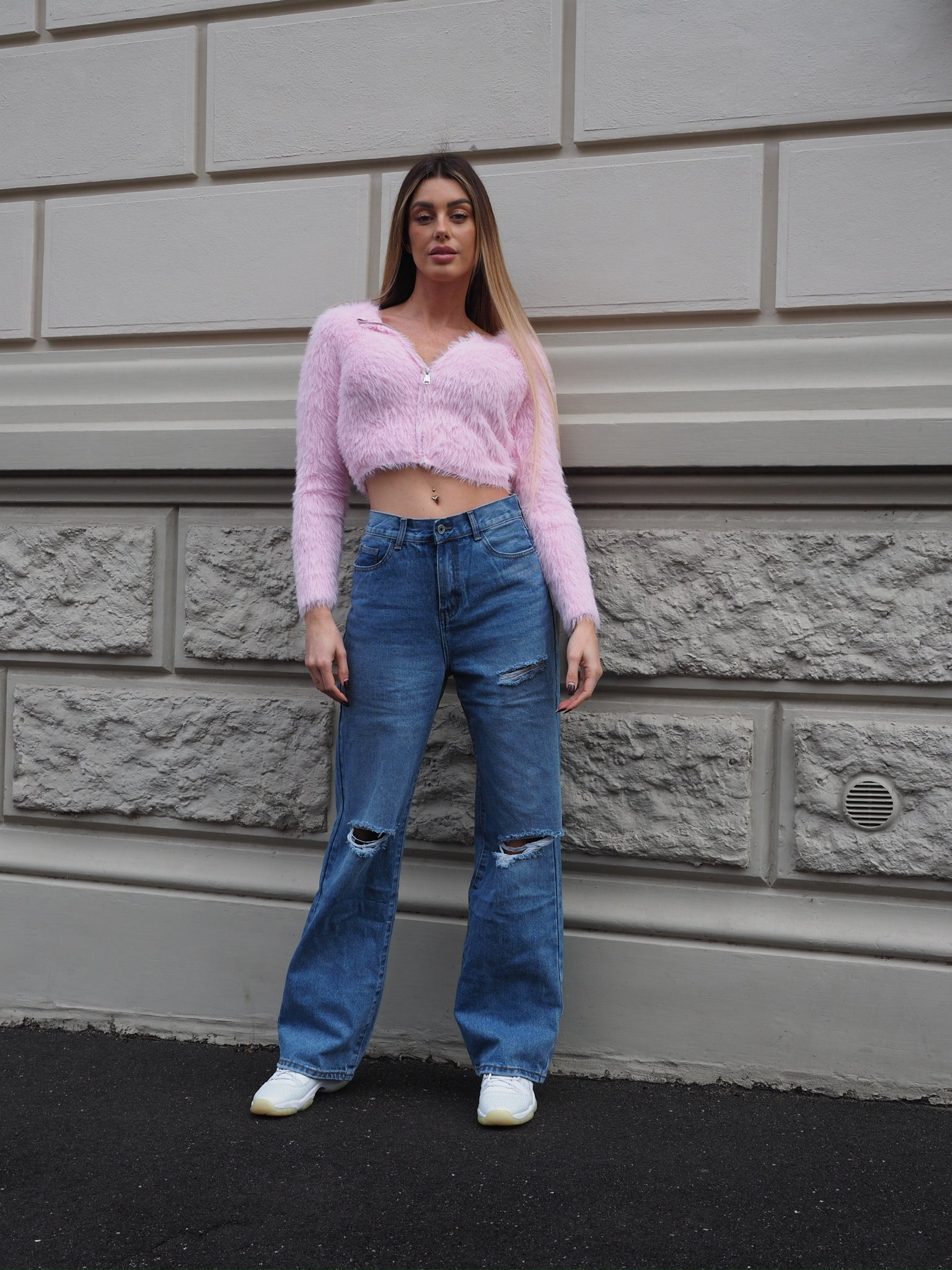 Jeans vita bassa con strappi