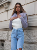 Jeans chiaro con strappi