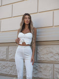 Completo top e pantalone con strass bianco
