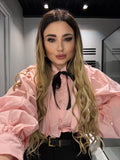 Camicia rosa con fiocco