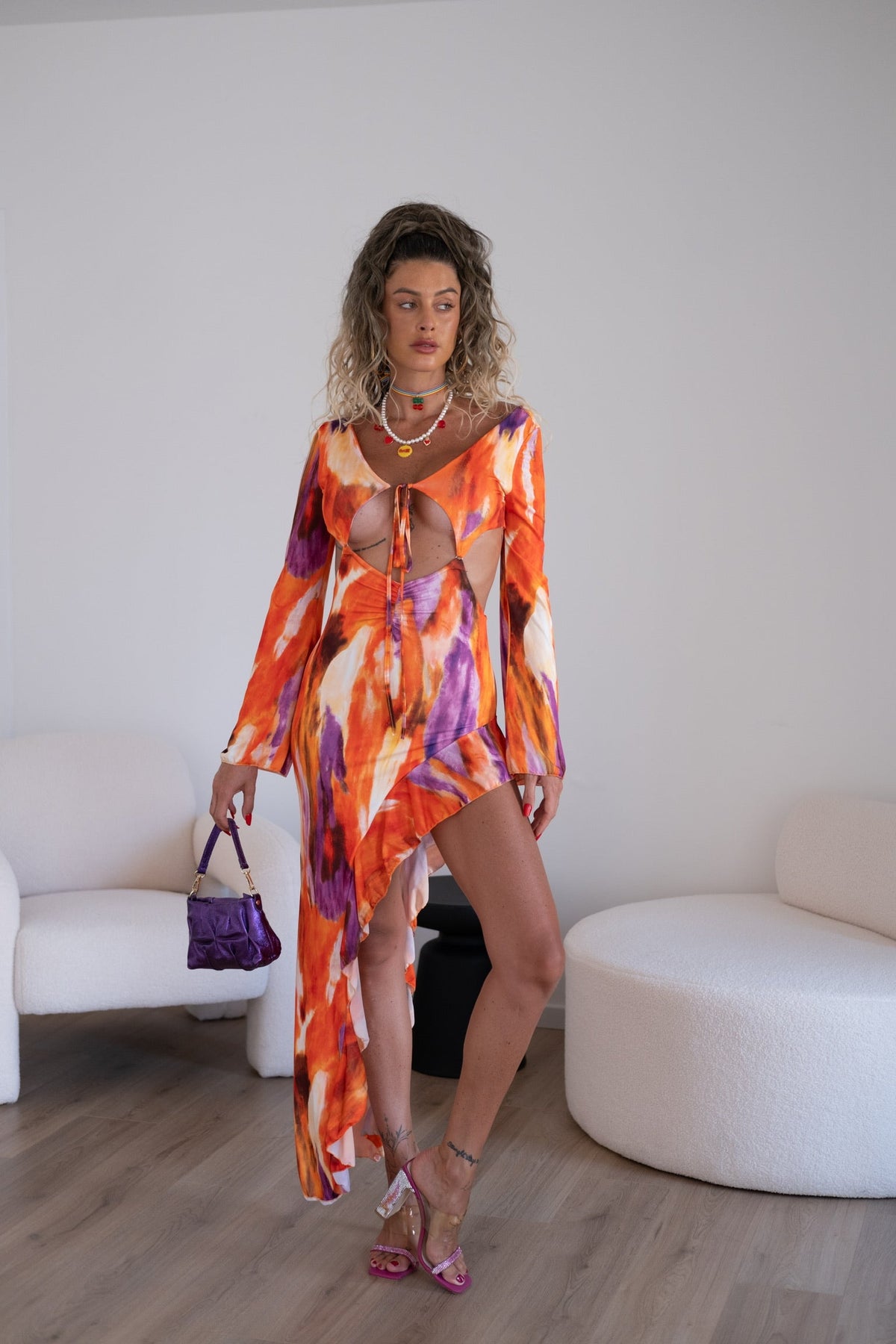 Abito asimmetrico arancio viola