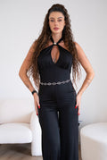 Tuta nera con gioiello